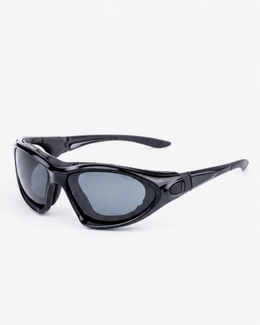 Morningside gravel cycling sunglasses, black full-rim wrap frame with smoke lens, three-quarter view
