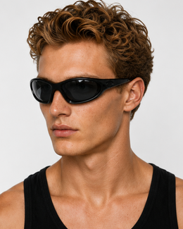 Male cyclist wearing Morningside gravel sunglasses with smoke lens, front view