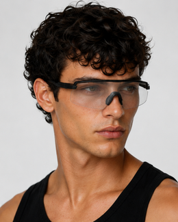 Man wearing the Flagler Clear Lens Sunglasses, eyes fully visible through the clear photochromic shield