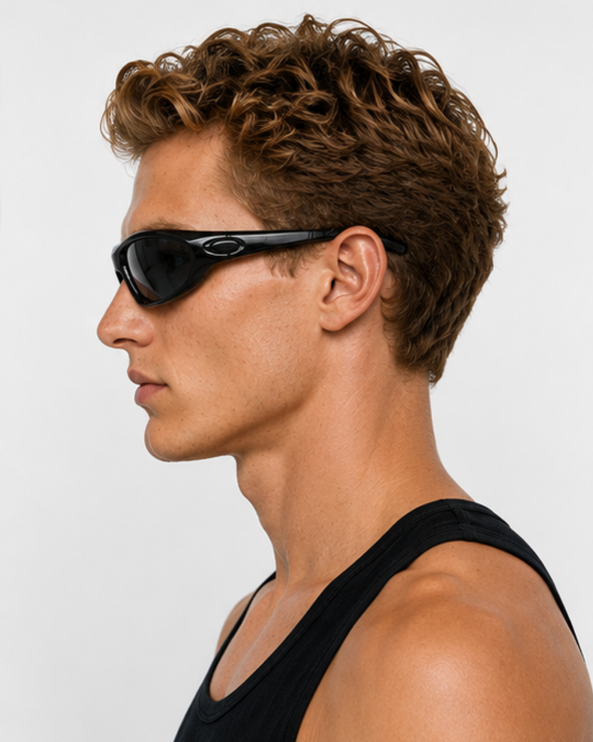 Male cyclist wearing Morningside gravel sunglasses, profile view showing the close wrap fit