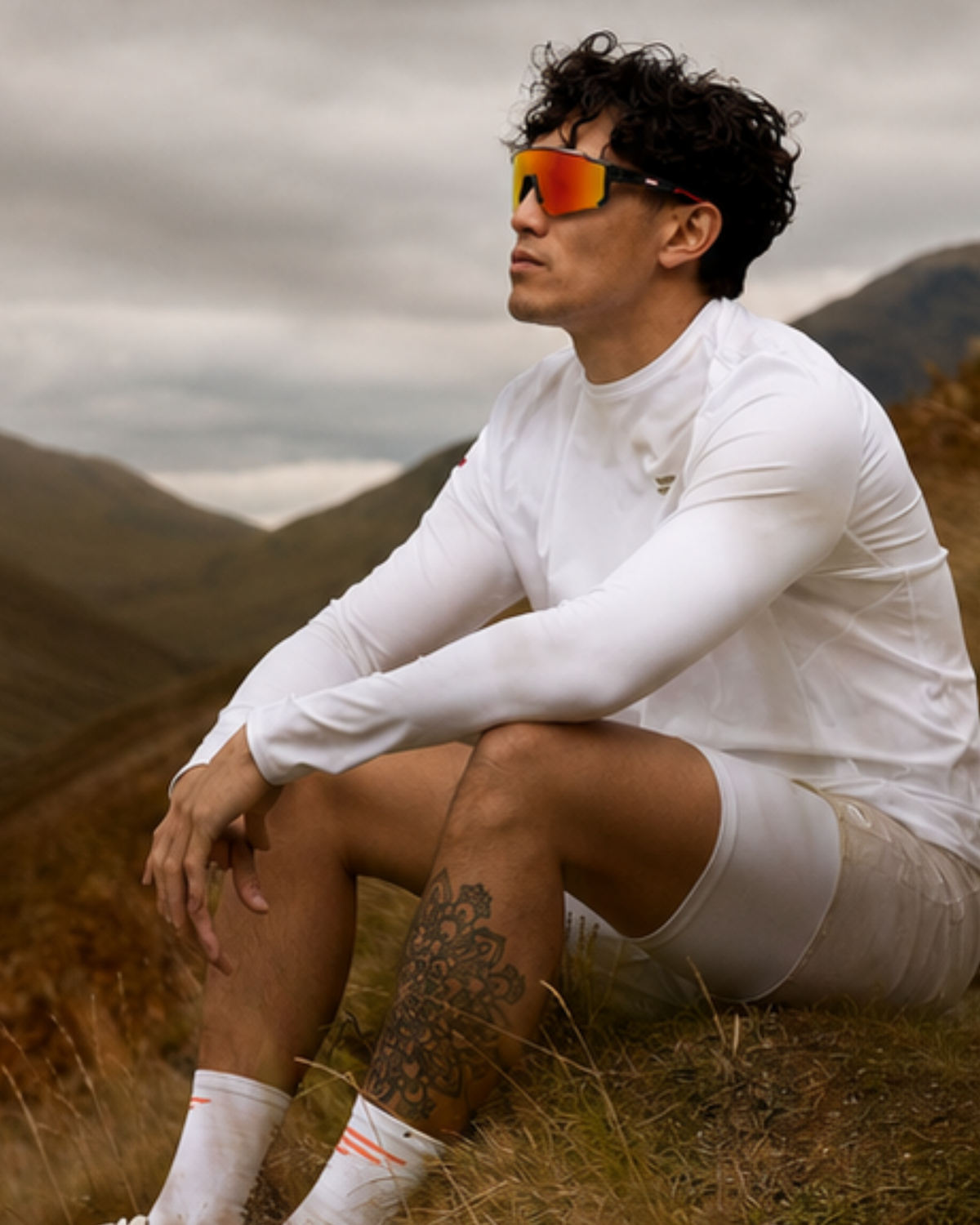 Athlete wearing Edgewater wraparound sunglasses outdoors in flat overcast light