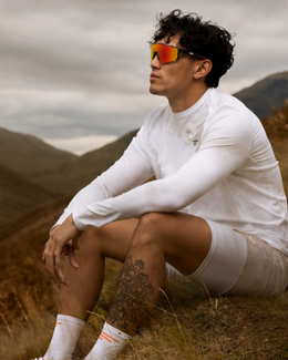 Athlete wearing Edgewater wraparound sunglasses outdoors in flat overcast light