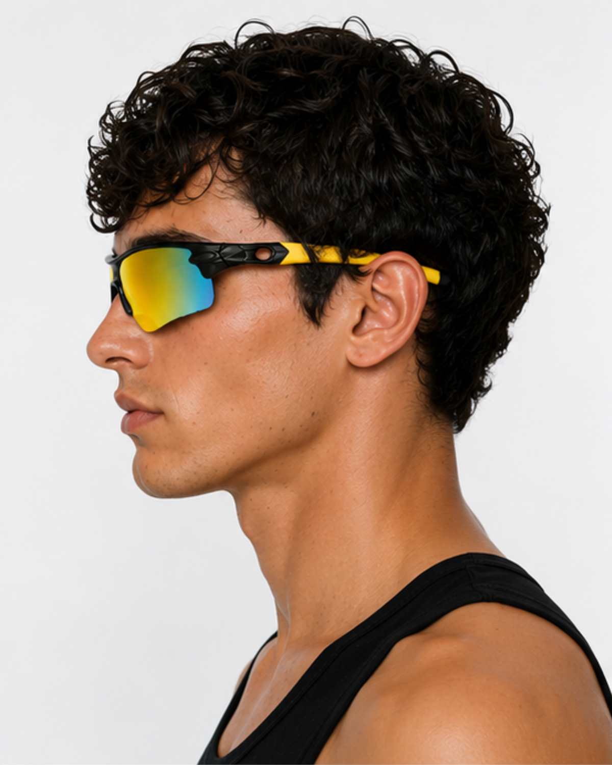 Profile of a cyclist wearing Little Havana sunglasses with yellow temples